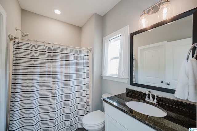 3104 Simms Lndg, Pelham, AL 35124 - bathroom featuring vanity, toilet, and a shower with shower curtain