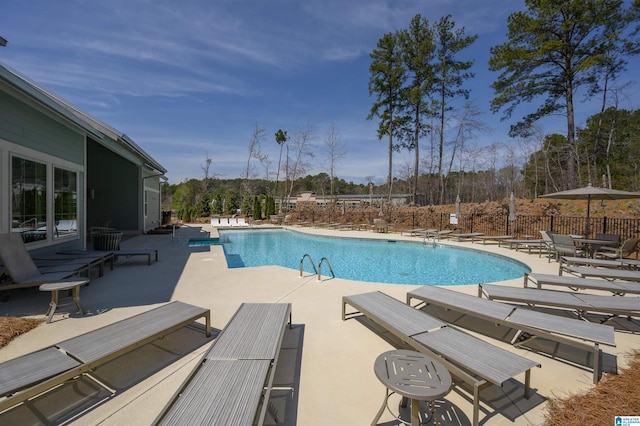 3104 Simms Lndg, Pelham, AL 35124 - community pool featuring a patio area and view of wooded area