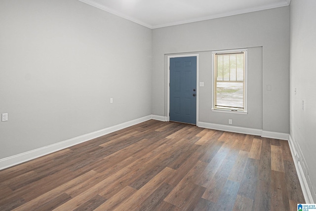 6365 Pocahontas Rd, Bessemer, AL 35022 - spare room with ornamental molding and dark wood finished floors