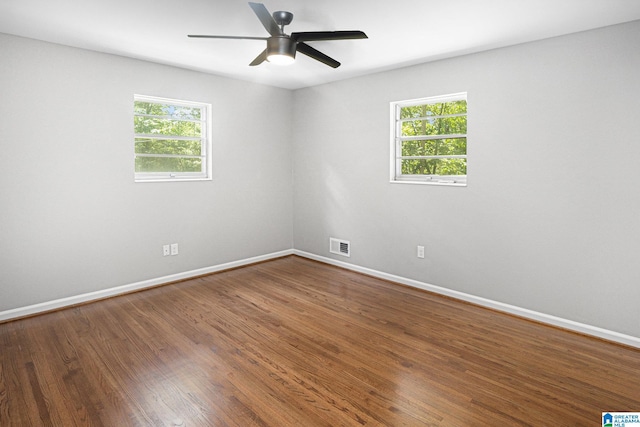 6365 Pocahontas Rd, Bessemer, AL 35022 - unfurnished room with plenty of natural light, ceiling fan, and wood finished floors