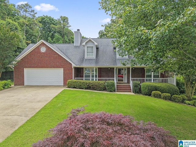 2009 Creely Cir, Birmingham, AL 35235 - cape cod house featuring brick siding, an attached garage, a front lawn, and a chimney