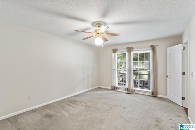 2009 Creely Cir, Birmingham, AL 35235 - carpeted spare room with ceiling fan, baseboards, and a textured ceiling
