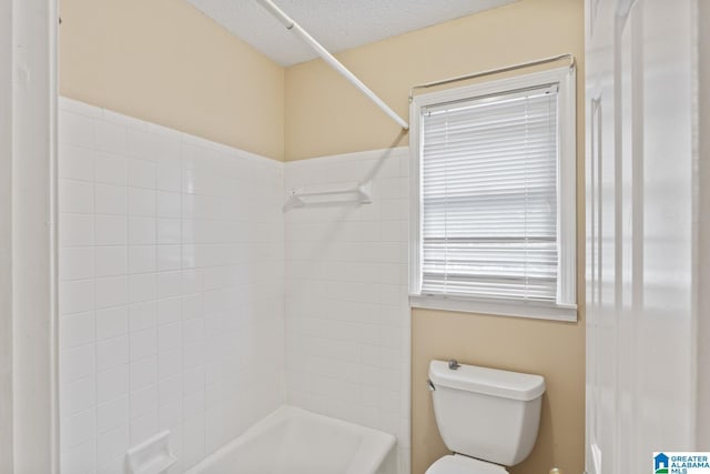 2009 Creely Cir, Birmingham, AL 35235 - full bath with toilet, a textured ceiling, and washtub / shower combination