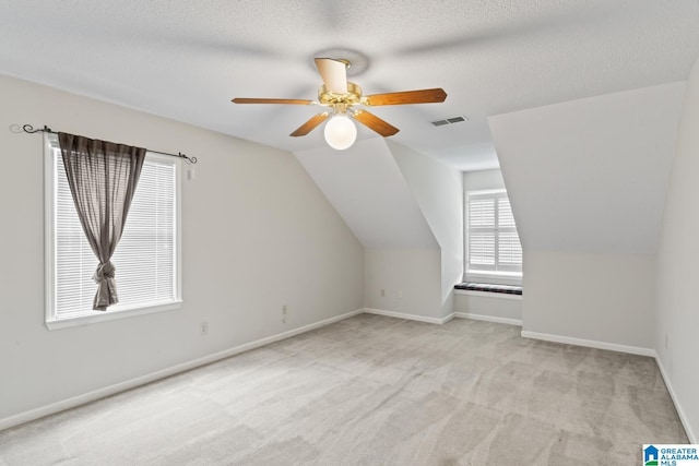 2009 Creely Cir, Birmingham, AL 35235 - bonus room featuring carpet, baseboards, ceiling fan, vaulted ceiling, and a textured ceiling