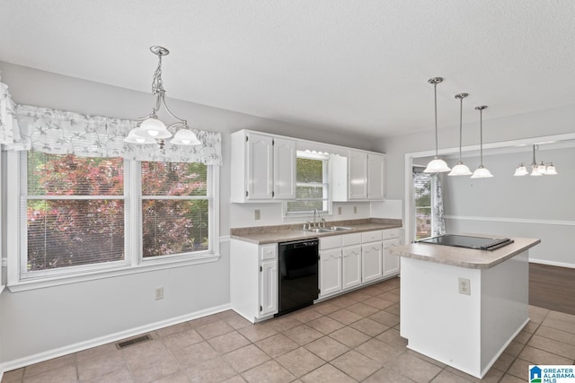 2009 Creely Cir, Birmingham, AL 35235 - kitchen with black appliances, a sink, white cabinetry, a textured ceiling, and light tile patterned floors