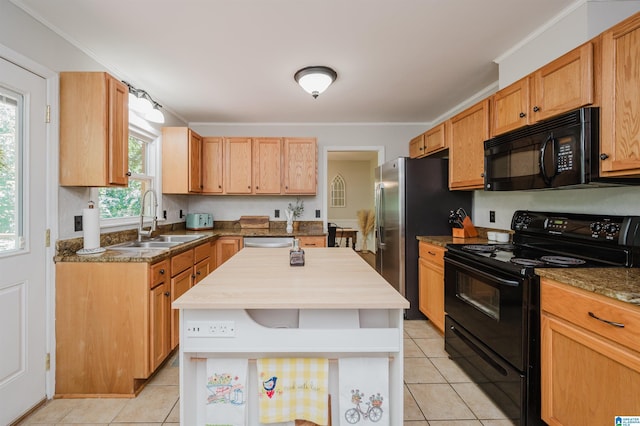 4669 Burning Tree Ln, Pelham, AL 35124 - kitchen with black appliances, a sink, light tile patterned flooring, open shelves, and wood counters