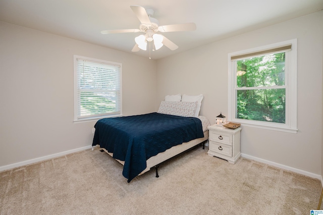 4669 Burning Tree Ln, Pelham, AL 35124 - bedroom with light colored carpet, baseboards, and a ceiling fan