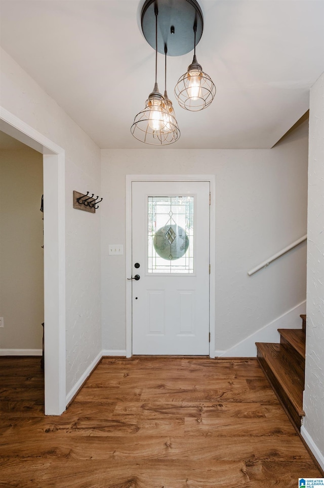 4669 Burning Tree Ln, Pelham, AL 35124 - foyer with wood finished floors, stairway, and baseboards