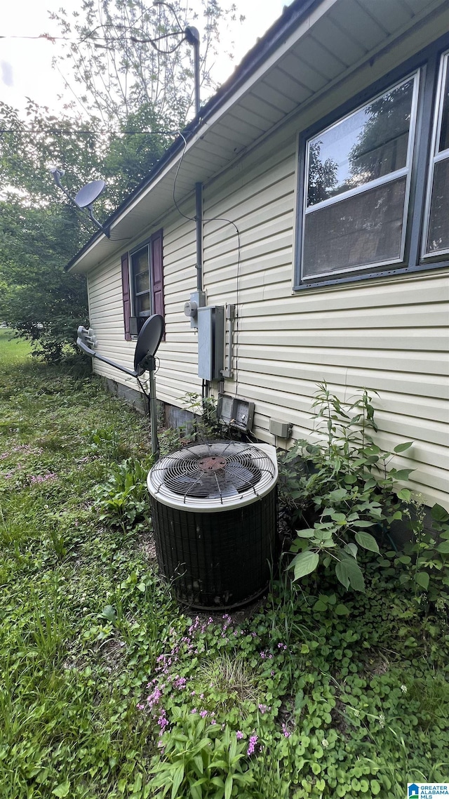 813 W 8th St, Sylacauga, AL 35150 - exterior view of central AC and a satellite dish