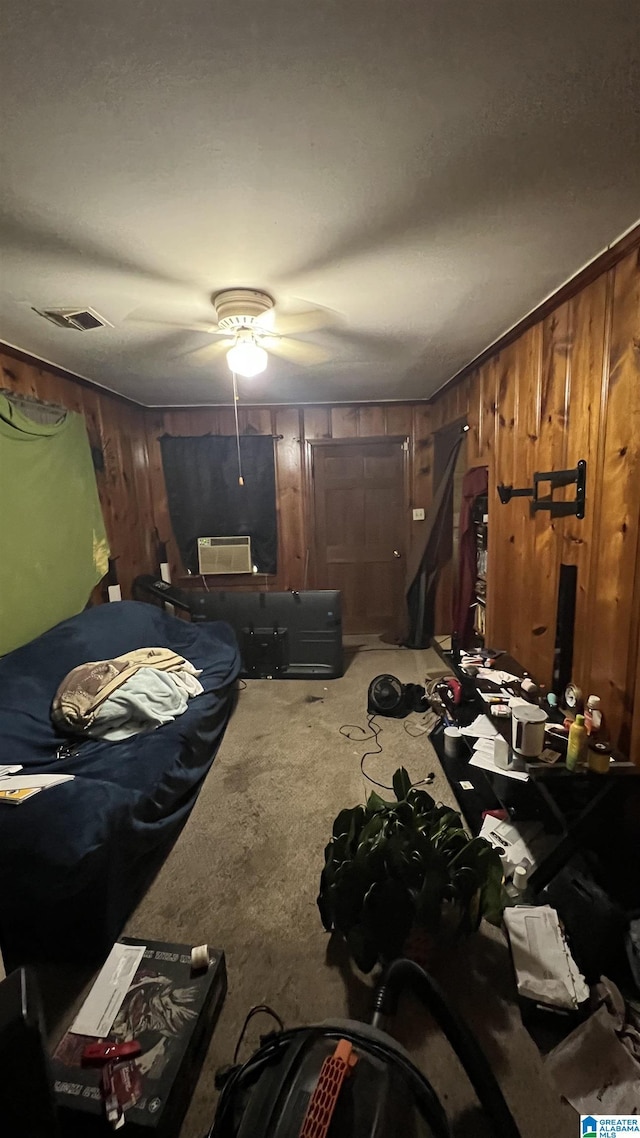 813 W 8th St, Sylacauga, AL 35150 - carpeted bedroom featuring wooden walls