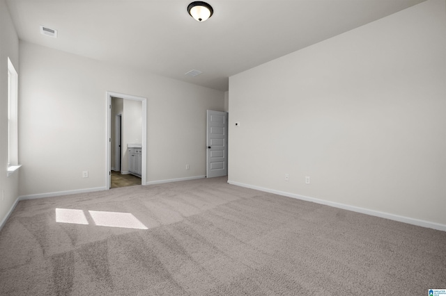 2017 Valley Run, Leeds, AL 35094 - unfurnished bedroom featuring carpet floors, baseboards, and ensuite bath