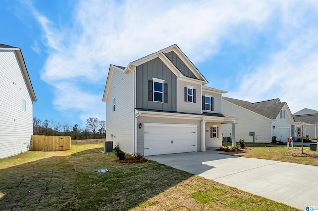 2017 Valley Run, Leeds, AL 35094 - view of front of house featuring board and batten siding, an attached garage, and driveway