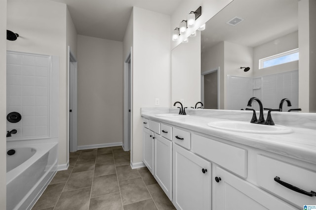 2017 Valley Run, Leeds, AL 35094 - full bath with double vanity, washtub / shower combination, baseboards, and tile patterned flooring