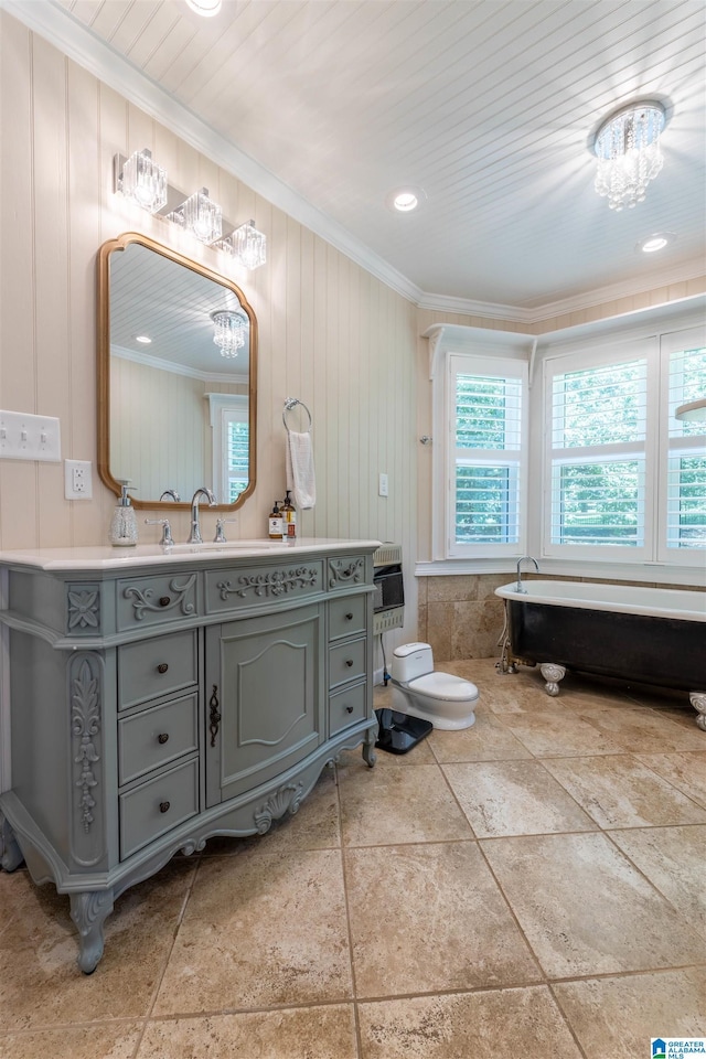 95 River Oaks Ln, Cropwell, AL 35054 - bathroom with a chandelier, crown molding, a freestanding tub, vanity, and toilet