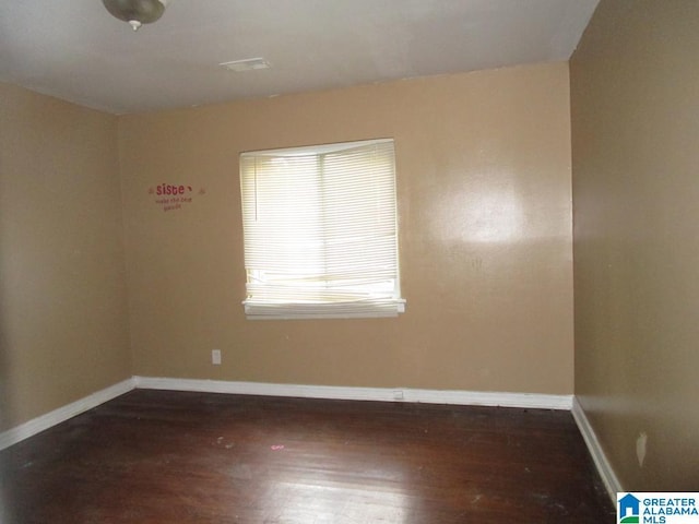 1782 49th St, Birmingham, AL 35208 - spare room featuring wood finished floors and baseboards