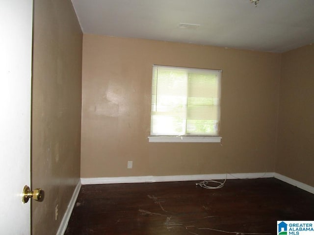 1782 49th St, Birmingham, AL 35208 - unfurnished room featuring wood finished floors and baseboards