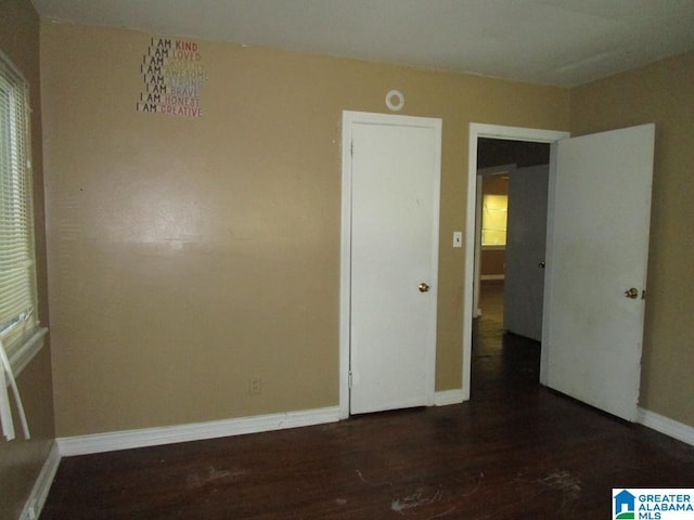 1782 49th St, Birmingham, AL 35208 - empty room featuring wood finished floors and baseboards