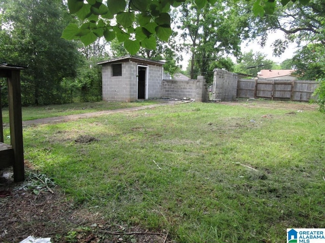 1782 49th St, Birmingham, AL 35208 - view of yard featuring an outdoor structure and a storage shed