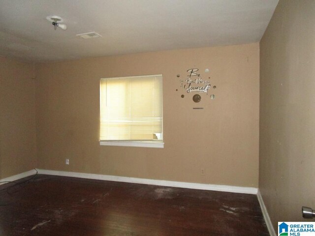 1782 49th St, Birmingham, AL 35208 - spare room featuring wood finished floors and baseboards