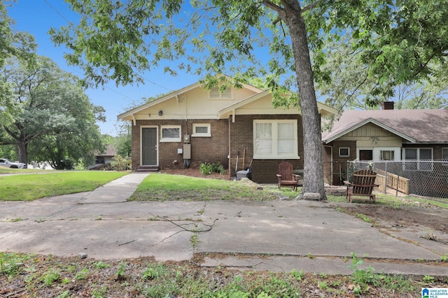 view of front of house featuring brick siding