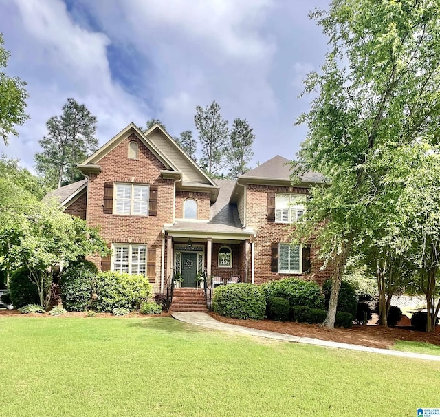 1048 Eagle Hollow Dr, Birmingham, AL 35242 - view of front facade with brick siding and a front yard
