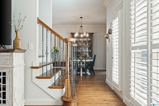 1048 Eagle Hollow Dr, Birmingham, AL 35242 - foyer entrance featuring stairway, a chandelier, light wood-style flooring, baseboards, and crown molding