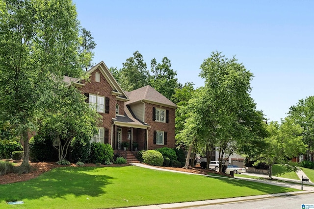 1048 Eagle Hollow Dr, Birmingham, AL 35242 - view of front facade with brick siding and a front lawn