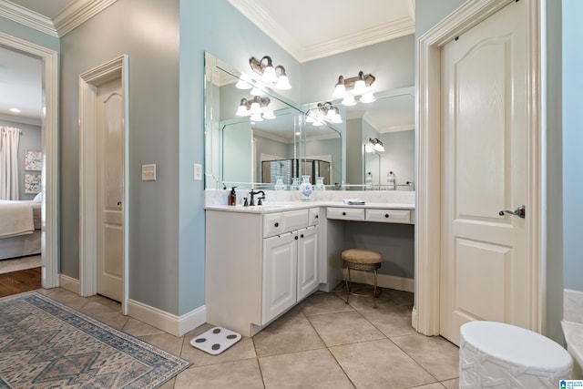 1048 Eagle Hollow Dr, Birmingham, AL 35242 - ensuite bathroom with crown molding, vanity, tile patterned flooring, baseboards, and a chandelier