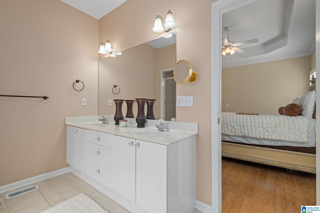 126 Landale Dr, Sterrett, AL 35147 - full bathroom with connected bathroom, double vanity, a ceiling fan, baseboards, and crown molding