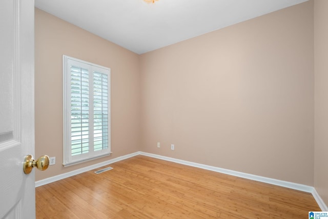 126 Landale Dr, Sterrett, AL 35147 - spare room with baseboards, light wood finished floors, and healthy amount of natural light