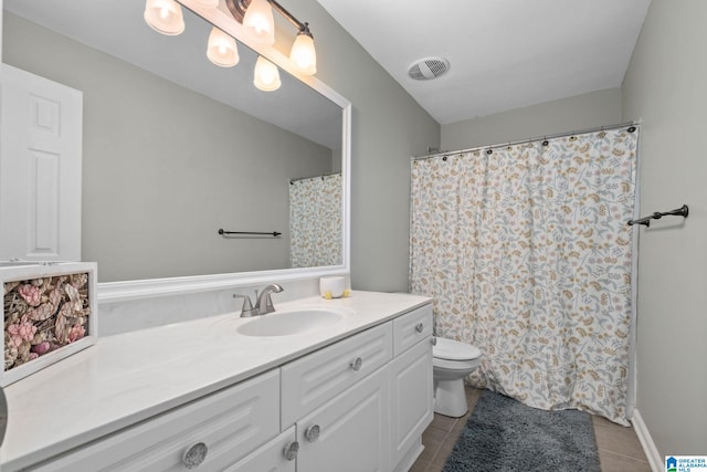 126 Landale Dr, Sterrett, AL 35147 - bathroom with vanity, tile patterned floors, and toilet