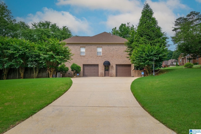 126 Landale Dr, Sterrett, AL 35147 - view of front of property with an attached garage, concrete driveway, a front yard, and brick siding