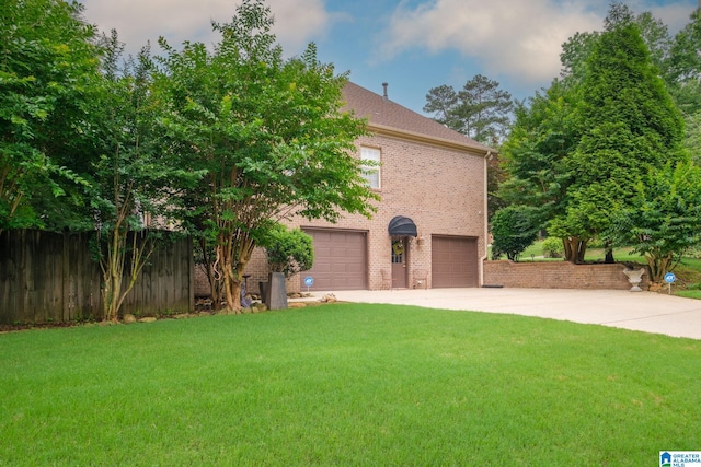126 Landale Dr, Sterrett, AL 35147 - view of front facade with driveway, brick siding, and an attached garage