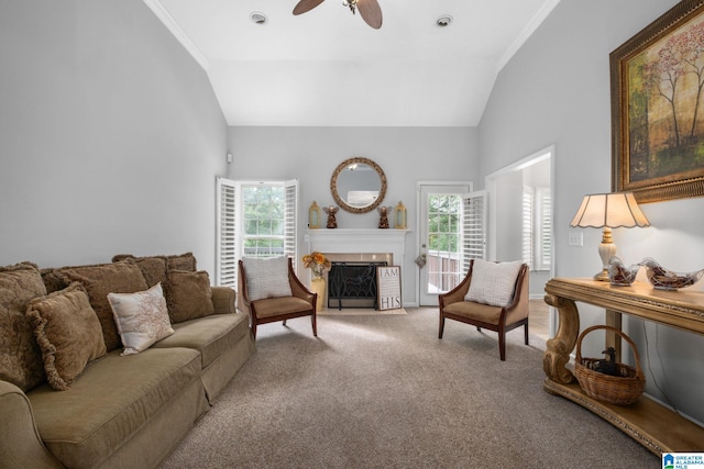 126 Landale Dr, Sterrett, AL 35147 - carpeted living area featuring healthy amount of natural light, ceiling fan, high vaulted ceiling, and a fireplace with flush hearth