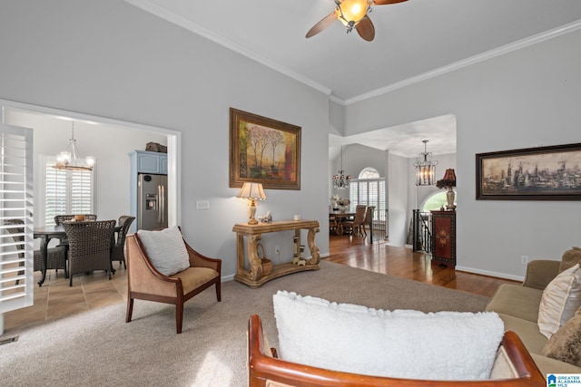 126 Landale Dr, Sterrett, AL 35147 - living area with a chandelier, ceiling fan, crown molding, and baseboards