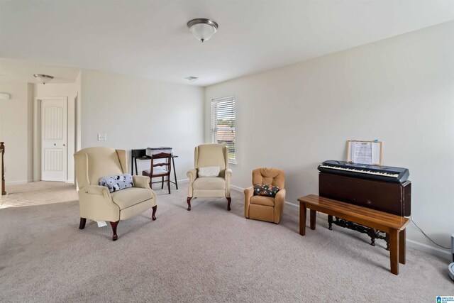 22873 Downing Park Cir, Mccalla, AL 35111 - living area featuring carpet floors and baseboards