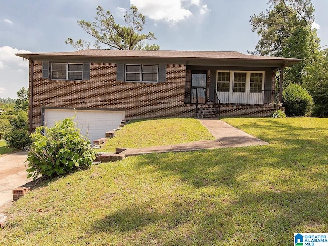 2270 Smithfield Ln N, Birmingham, AL 35207 - view of front of house with a garage, a front yard, a porch, and brick siding