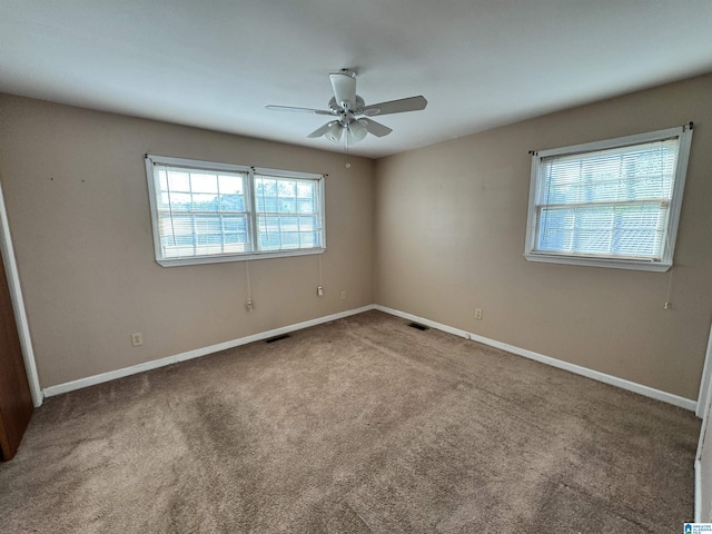 2270 Smithfield Ln N, Birmingham, AL 35207 - spare room featuring a ceiling fan, carpet, and baseboards