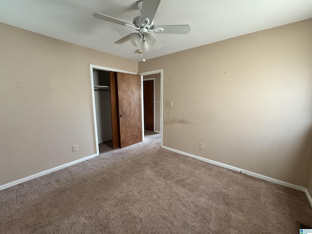 2270 Smithfield Ln N, Birmingham, AL 35207 - unfurnished bedroom featuring carpet floors, a closet, baseboards, and a ceiling fan