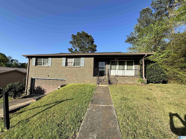 2270 Smithfield Ln N, Birmingham, AL 35207 - ranch-style home featuring covered porch, a front lawn, brick siding, and an attached garage