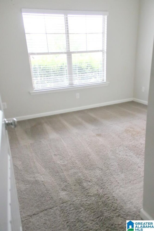 4905 Stonecreek Way, Calera, AL 35040 - carpeted empty room with baseboards
