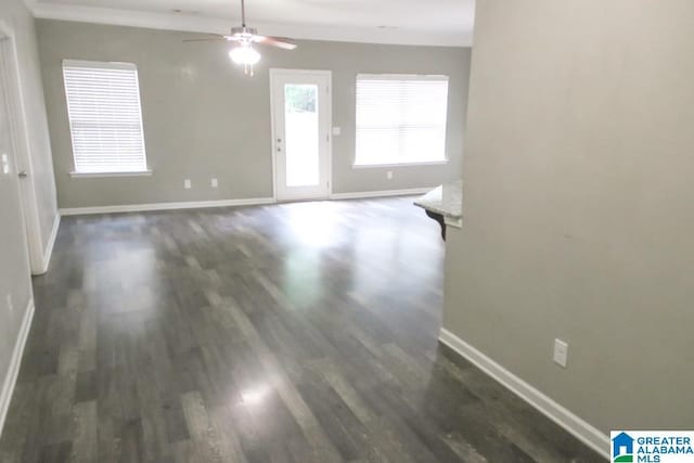4905 Stonecreek Way, Calera, AL 35040 - unfurnished room featuring baseboards, dark wood-style floors, and ceiling fan