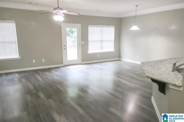 4905 Stonecreek Way, Calera, AL 35040 - unfurnished dining area with dark wood finished floors, baseboards, a ceiling fan, and ornamental molding