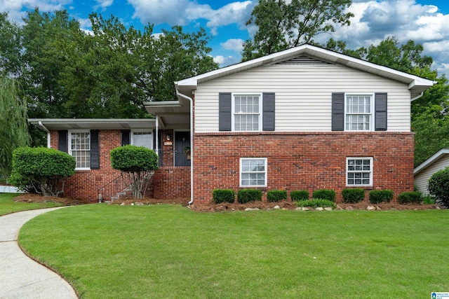400 Art Hanes Blvd, Birmingham, AL 35213 - split level home with brick siding and a front lawn