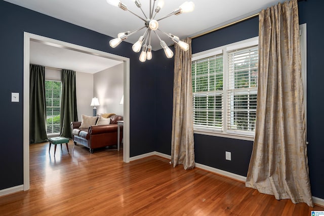 400 Art Hanes Blvd, Birmingham, AL 35213 - dining area featuring a chandelier, healthy amount of natural light, wood finished floors, and baseboards