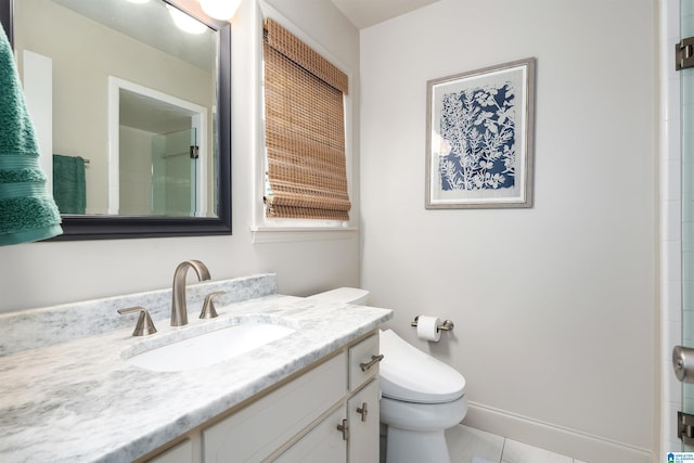 400 Art Hanes Blvd, Birmingham, AL 35213 - full bathroom featuring toilet, vanity, a shower, and baseboards