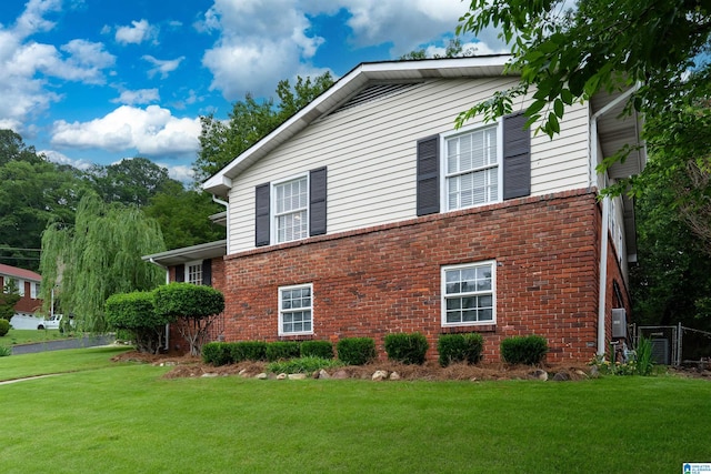 400 Art Hanes Blvd, Birmingham, AL 35213 - view of side of property with brick siding and a lawn