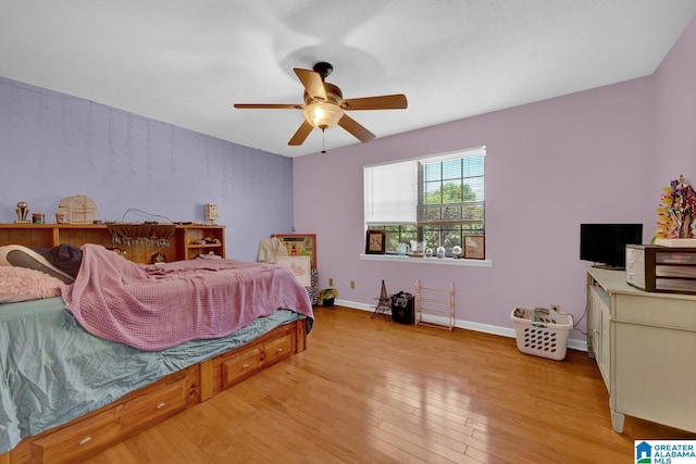 85 County Road 738, Cullman, AL 35055 - bedroom featuring light wood finished floors, baseboards, and ceiling fan