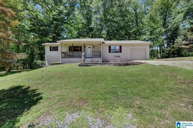 85 County Road 738, Cullman, AL 35055 - single story home featuring covered porch, driveway, a garage, and a front yard