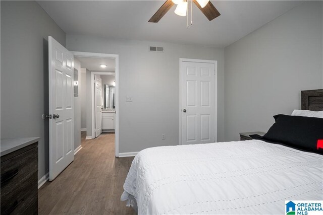 1721 Hackberry Ln Unit 6, Tuscaloosa, AL 35401 - bedroom with dark wood finished floors and a ceiling fan